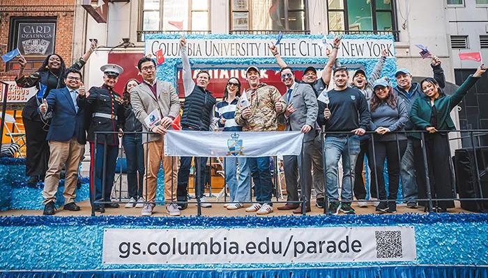 Columbia veterans pose on a float in the Veterans Day Parade 2024. 
