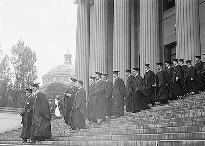 1913: Columbia College students wear black academic dress at Commencement.