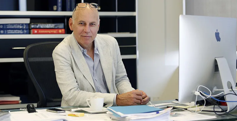 Charles Zuker at his desk