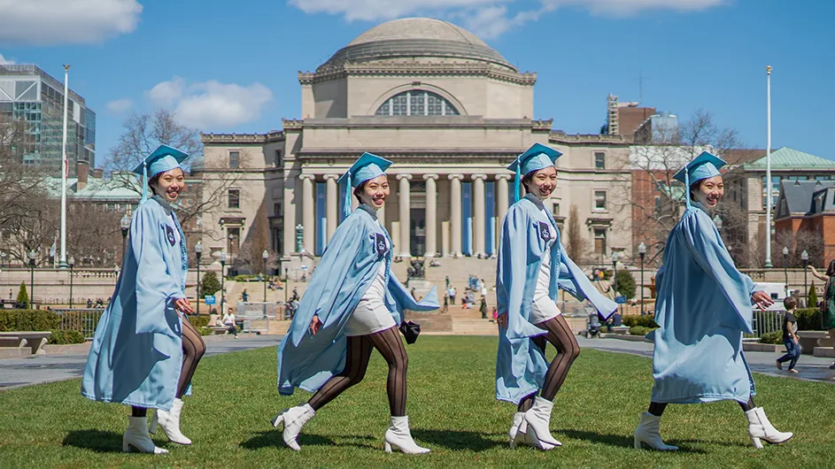 Rachel Yeung walks in front of Low Library